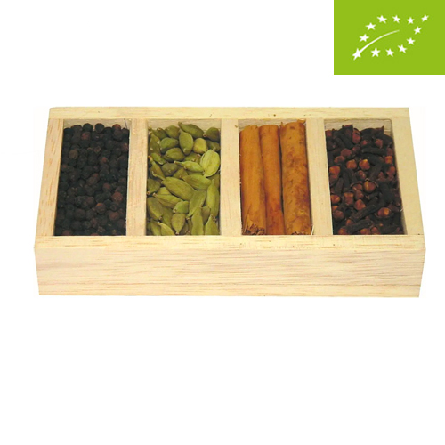 Caja de madera con tapa transparente que contiene cuatro especias ecologicas y de Comercio Justo